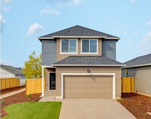 front of property featuring a garage