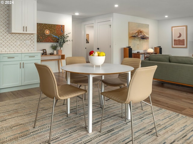 818 Ash St, Lake Oswego, OR 97034 - dining area with light wood-type flooring and recessed lighting