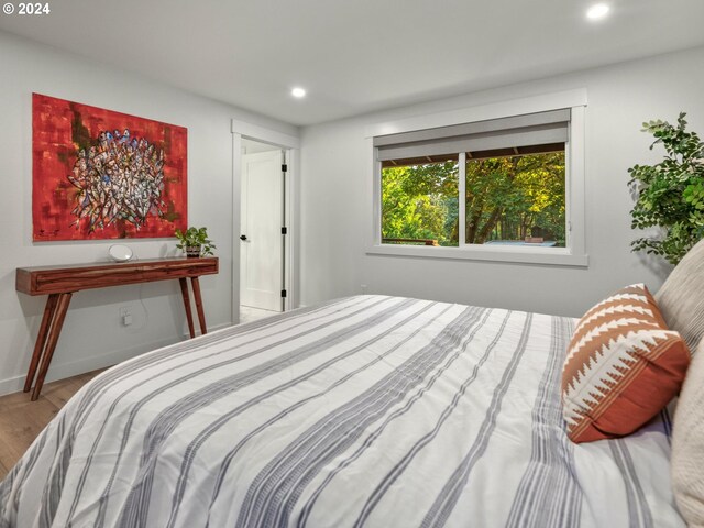 818 Ash St, Lake Oswego, OR 97034 - bedroom with wood finished floors, recessed lighting, and baseboards