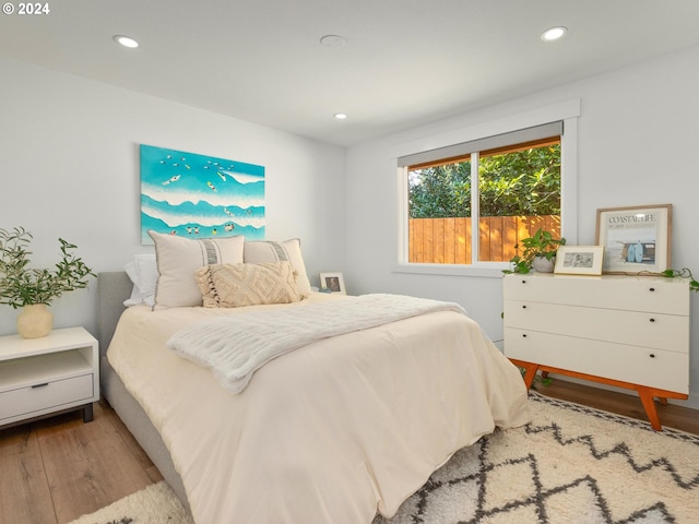 bedroom featuring light hardwood / wood-style floors