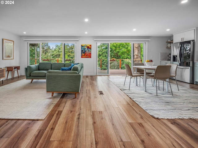 living room featuring light wood-type flooring