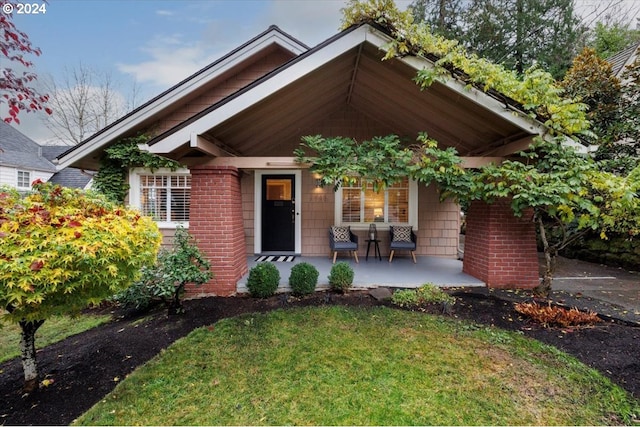 view of front of home featuring covered porch