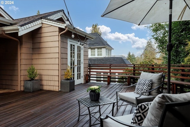 wooden terrace featuring french doors