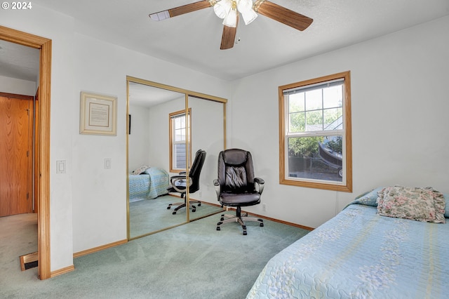 bedroom featuring a closet, carpet, and ceiling fan