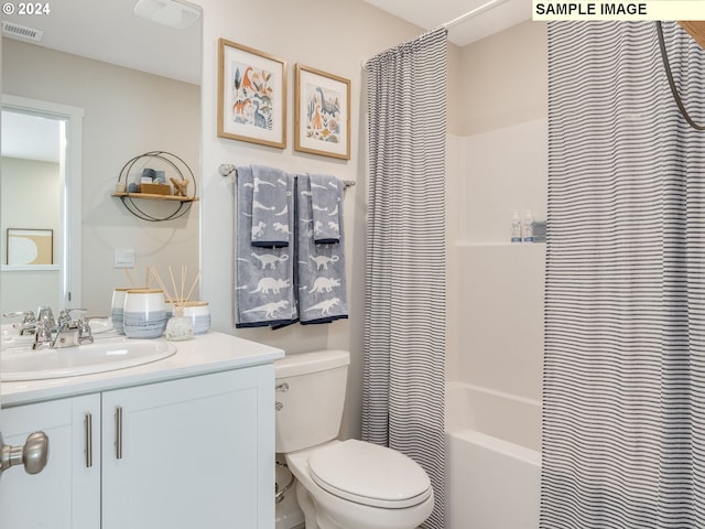 full bathroom featuring shower / bathtub combination with curtain, vanity, and toilet