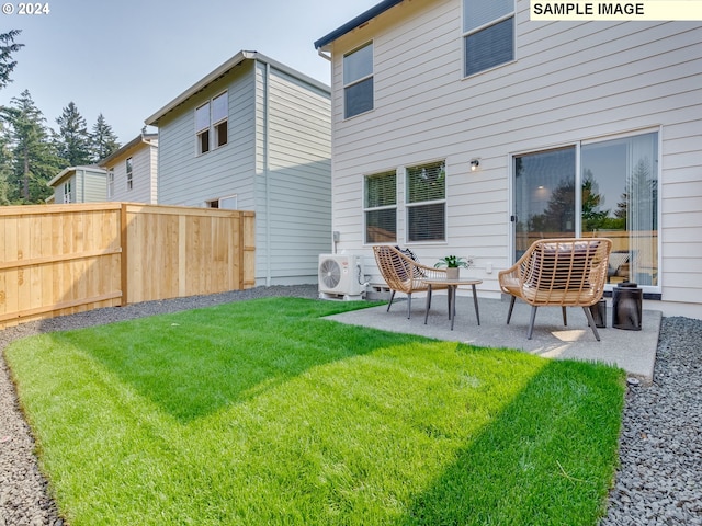 back of property featuring ac unit, a patio area, and a yard