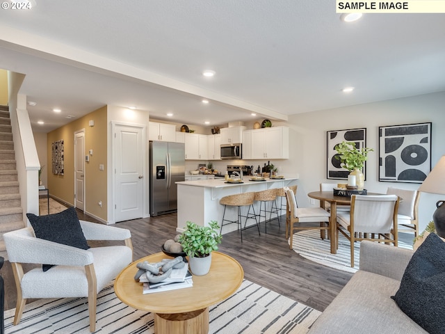 living room with dark hardwood / wood-style floors