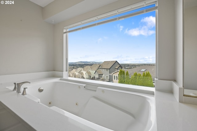 bathroom featuring a bath