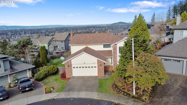 drone / aerial view featuring a mountain view