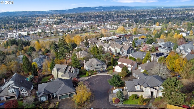 drone / aerial view featuring a mountain view