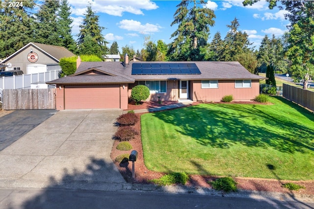 single story home featuring solar panels, a front lawn, and a garage