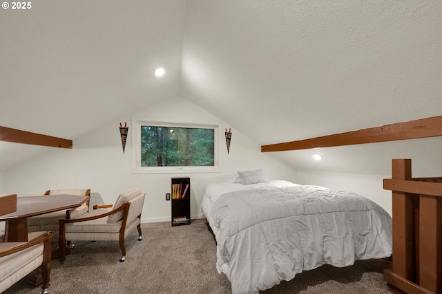 bedroom featuring carpet floors and lofted ceiling