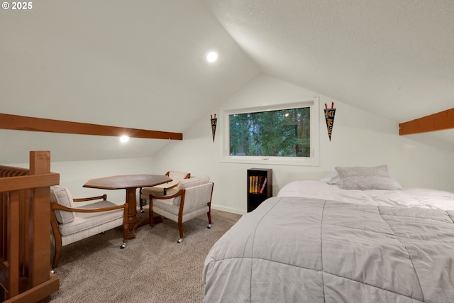 bedroom with carpet and vaulted ceiling