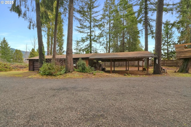 view of front facade featuring a carport