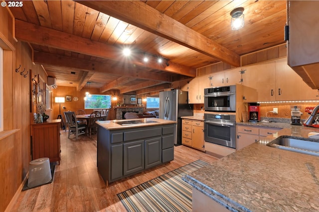 kitchen featuring beam ceiling, gray cabinets, wooden ceiling, and sink