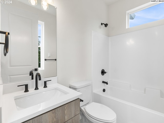 full bathroom featuring shower / tub combination, vanity, and toilet