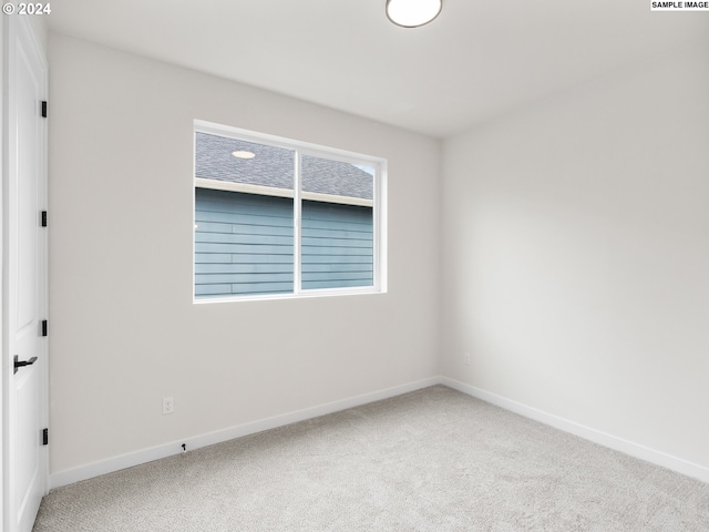 spare room with carpet flooring