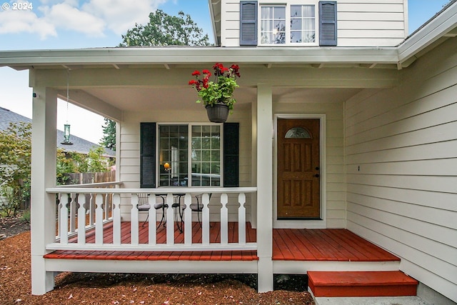 doorway to property featuring a porch