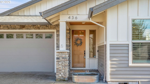 entrance to property featuring a garage