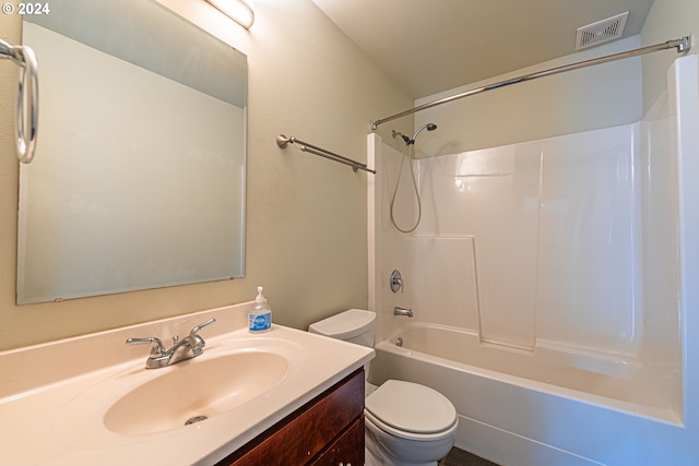 full bathroom with toilet, vanity, and shower / bath combination