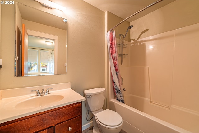 full bathroom featuring vanity, toilet, and shower / tub combo