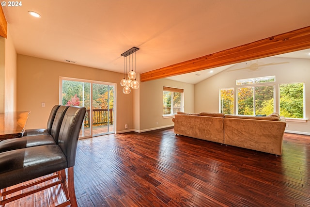 living room with lofted ceiling with beams, plenty of natural light, a notable chandelier, and dark hardwood / wood-style floors