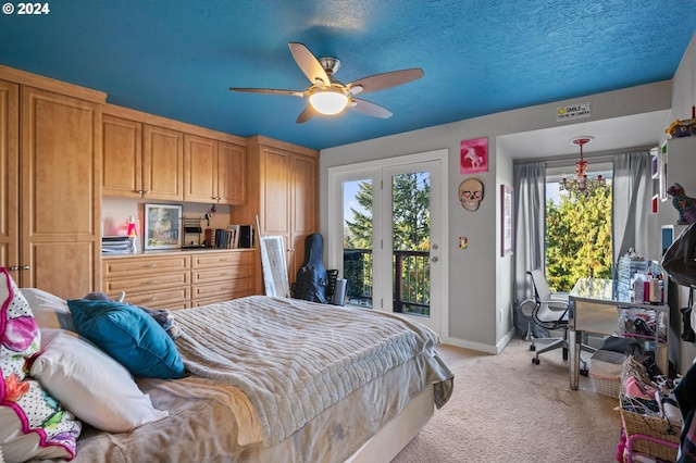 bedroom featuring a ceiling fan, baseboards, access to exterior, and light carpet