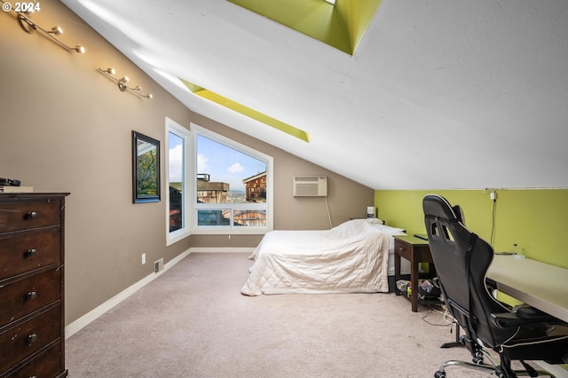 bedroom featuring baseboards, a wall mounted AC, carpet, and vaulted ceiling