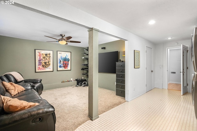 living area featuring recessed lighting, decorative columns, baseboards, and a ceiling fan