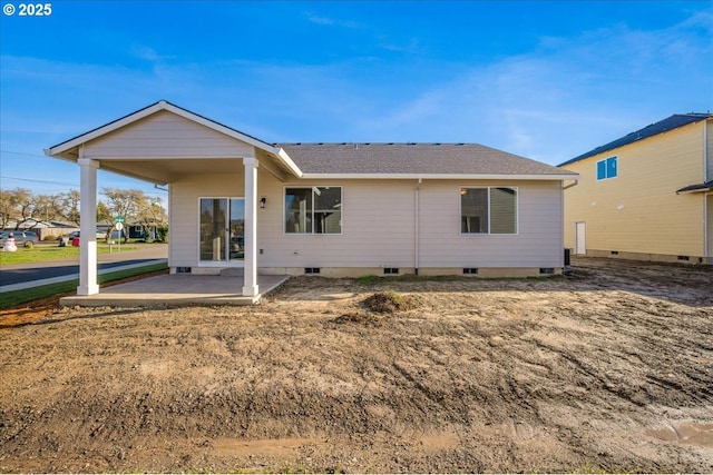 rear view of house featuring a patio area