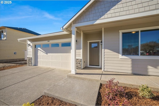 property entrance with a garage