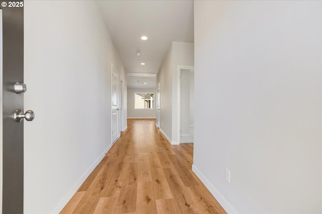 hallway featuring light hardwood / wood-style floors