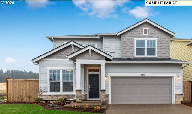 craftsman house featuring a garage