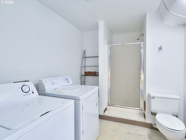 laundry room featuring light tile patterned floors and independent washer and dryer