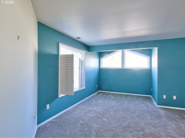 empty room with carpet floors