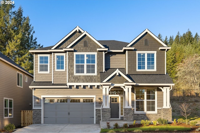 craftsman house with a garage