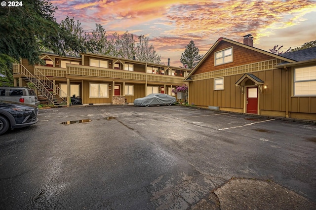 view of parking at dusk