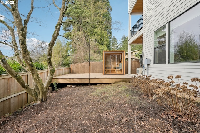 view of yard featuring a wooden deck