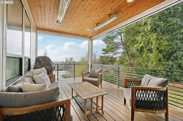 deck featuring outdoor lounge area