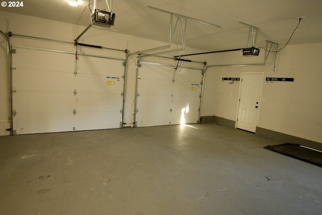 garage featuring a garage door opener