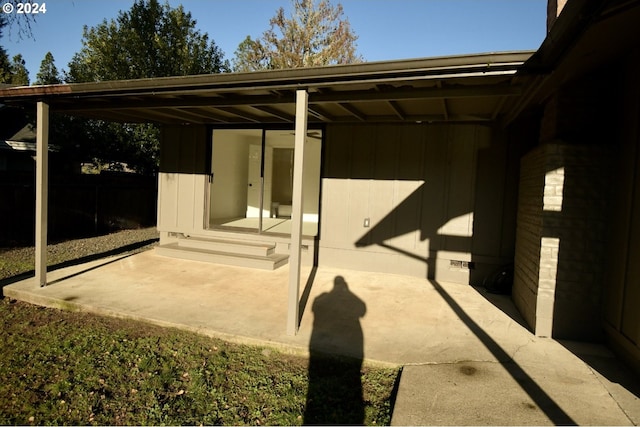 view of patio featuring a carport