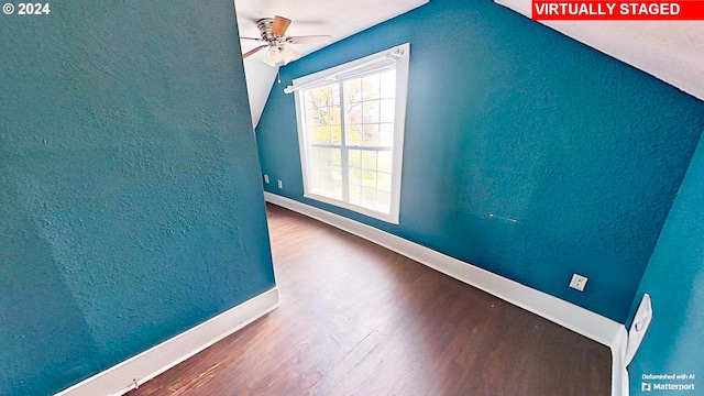 bonus room featuring hardwood / wood-style flooring, ceiling fan, and vaulted ceiling