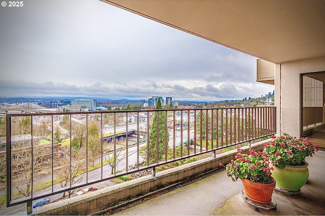 balcony featuring a city view