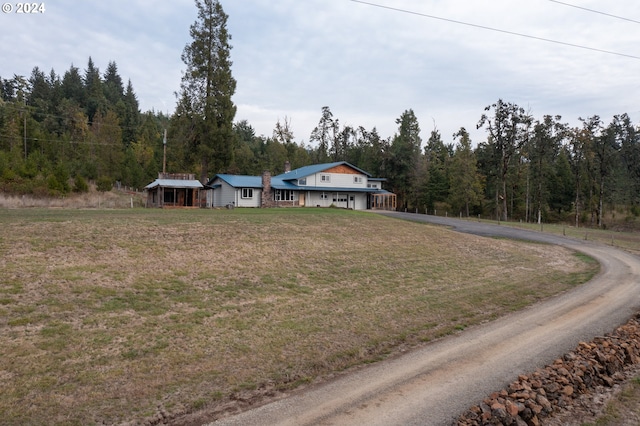 37075 Camp Creek Rd, Springfield, OR 97478 - view of front facade with driveway, a forest view, and a front yard