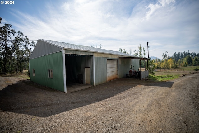 37075 Camp Creek Rd, Springfield, OR 97478 - garage featuring a garage and dirt driveway