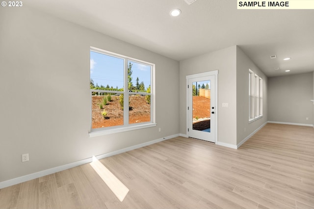 interior space with light hardwood / wood-style floors