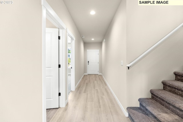 corridor featuring light hardwood / wood-style flooring