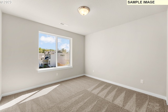 empty room with carpet floors