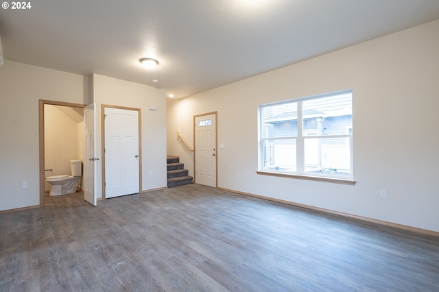 spare room with hardwood / wood-style floors