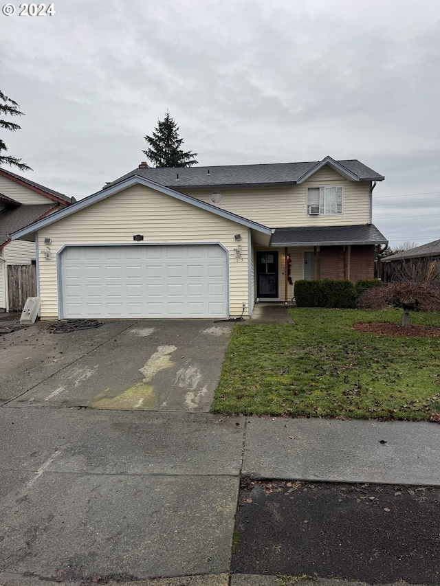 4019 NE 136th Ct, Vancouver, WA 98682 - view of front facade with a porch, a garage, and a front lawn